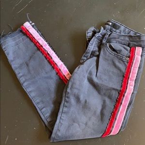 Black with red and pink stripes on side